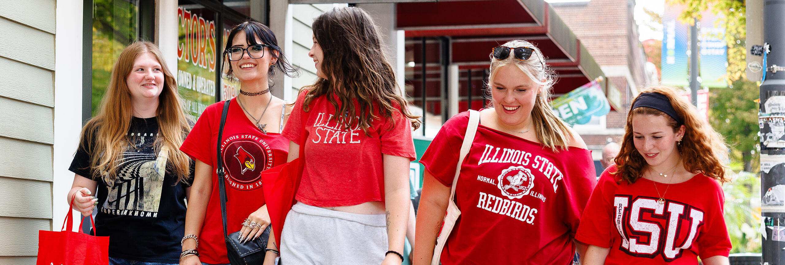 A group of five Illinois State University students around Uptown Normal