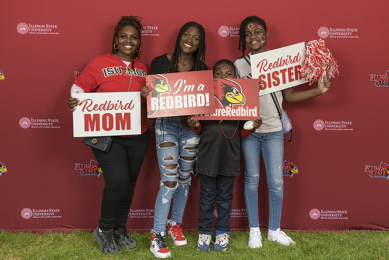 Family posing with ISU Family Weekend printables
